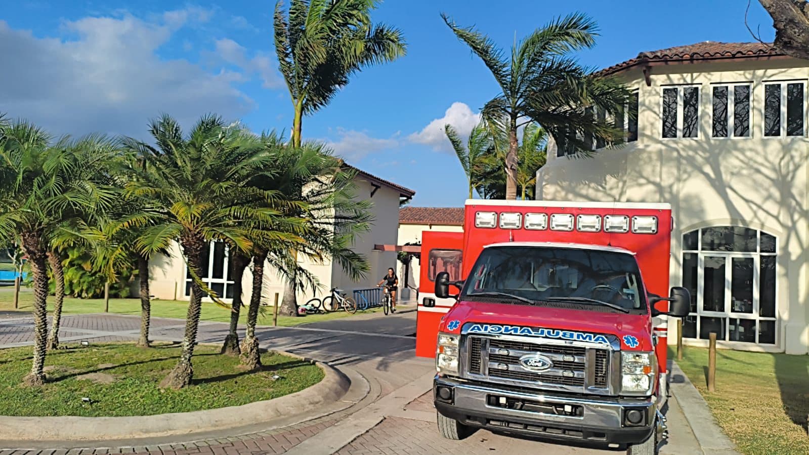 An EMTS ambulance inside a gated residential community