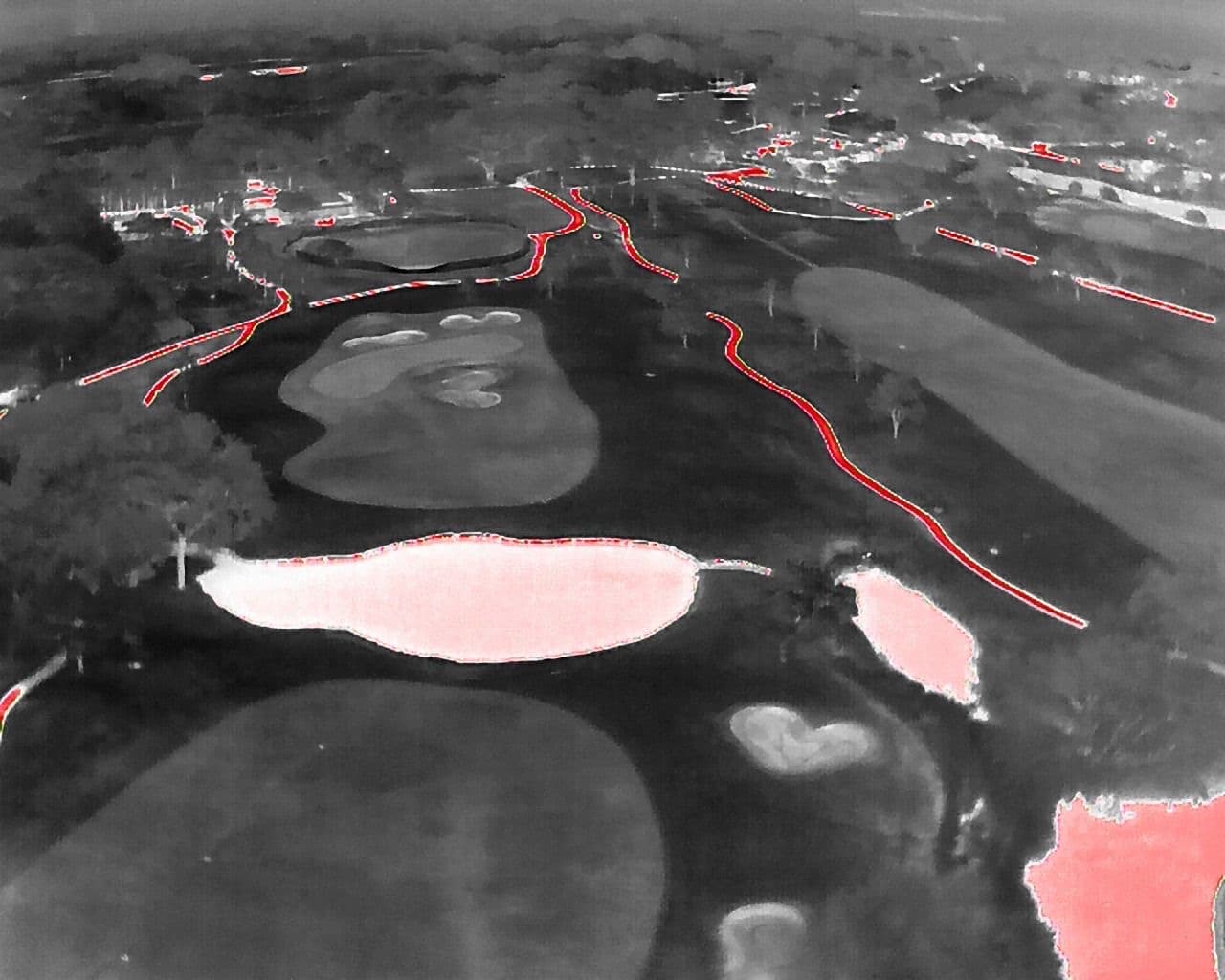 Thermal imagery captured from the EMTS drone, showing heat signatures across open ground