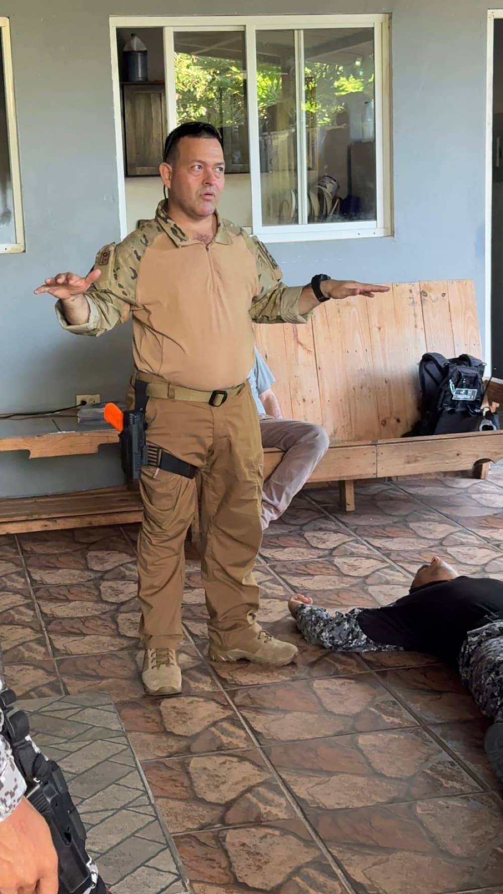 EMTS instructor delivering tactical casualty care training to Panamanian police